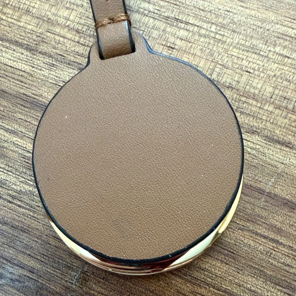 Michael Kors Brown and Gold bag tag